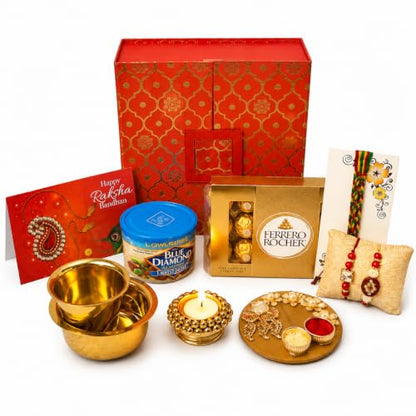 LOVENSPIRE Brocade Gift Box Raksha Bandhan Hamper for Brother and Bhabhi - Includes 2 Traditional Handmade Rakhi, Chocolates Pack, Candle & Haldi Kumkum Holder, Greeting Card with Roli Chawal - color: Premium Hamper